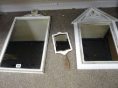 Two white and gilt painted wall mirrors and a hand held mirror