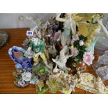 Collection of composition fairy and other ornamental figurines