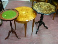 Circular inlaid music box and an inlaid tripod wine table and one other