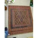 Cazak rug, tonal red, blue and brown, multiple bordered with classical central block pattern, 118