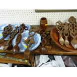 Good quantity of lovespoons and other treen ware