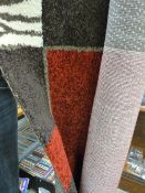 Rolled fine condition rug by Textiles Vertrauen