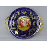 Vienna type porcelain two handled tray, cobalt and gilt decorated with central figural panel