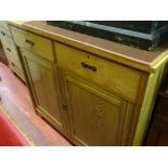 Light wood sideboard with two drawers over two base cupboards