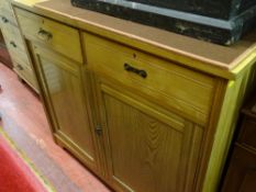 Light wood sideboard with two drawers over two base cupboards