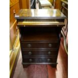 Small mahogany inlaid side cabinet with brush slider