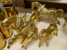 Pair of brass shire horses and two other brass horses