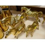 Pair of brass shire horses and two other brass horses