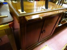 Vintage mahogany two door storage cabinet with upper brushing slide