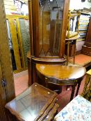 Reproduction corner cupboard with upper glazed door, a serpent front half moon hall table and nest