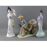 Three porcelain figurines of Oriental girls