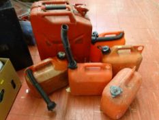 Box of metal and plastic petrol cans