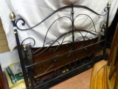 Black metal framed bed with wooden slats