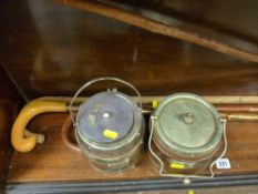 Small parcel of walking sticks and two polished wood and electroplate biscuit barrels