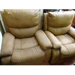 Pair of modern soft leather effect recliner armchairs