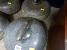 Two similar looking vintage curling stones