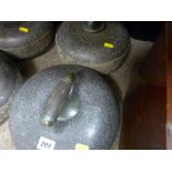 Two similar looking vintage curling stones