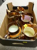 Six decorative copper lustre jugs