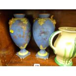 Royal Doulton tulip decorated jug and a pair of Staffs vases