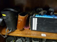 Two vintage cased sets of binoculars, one by Monn of Budapest and a boxed modern tripod
