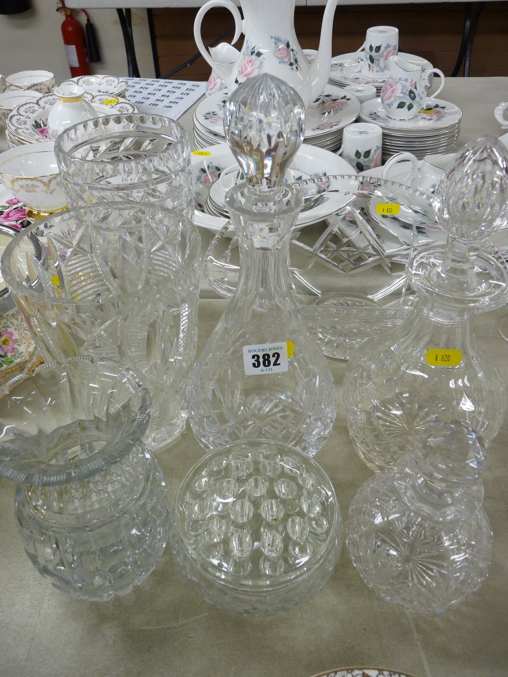 Two quality glass decanters with stoppers, two heavy glass vases and bowl etc