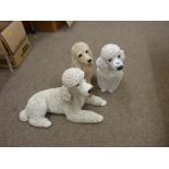 Three decorative models of poodles