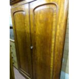 Victorian mahogany two door wardrobe with left side hanging space and four sliding trays and three