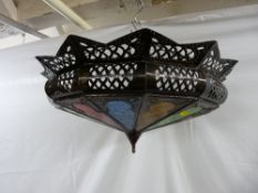 Very colourful metallic and multi-coloured glass ceiling lampshade