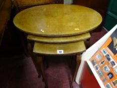 Walnut topped nest of three tables