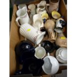 Box of ornamental jugs including Toby jugs