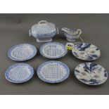 Child's miniature pottery part dinner service and two further blue and white plates, early dates