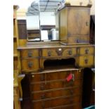 Three items of walnut mid Century bedroom furniture to include a mirrored dressing table, a five