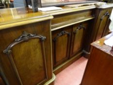 Victorian mahogany inverted breakfront four door sideboard base with central frieze drawer and