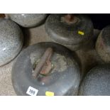 Two similar looking vintage curling stones