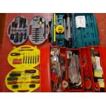 Red cantilever toolbox and contents, a cased Powermaster laser level and two plastic cases of