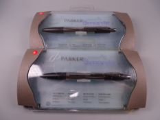 TWO MODERN CARBON PARKER DIMONITE GEL PENS in original packaging