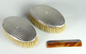 PAIR OF SILVER OVAL ENGINE TURNED BRUSHES with engraved initials to cartouche together with