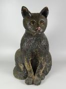 A LARGE STUDIO POTTERY SEATED CAT in the Ewenny style, signed (Angela….?) and dated 1995, 45cms