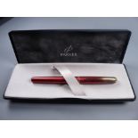 A MODERN (2001-2004) BOXED SUNNY RED PARKER INFLECTION FOUNTAIN PEN with gold plated trim &