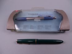 A VINTAGE GREEN PARKER SLIMFOLD FOUNTAIN PEN with 14k nib & gold plated trim, engraved name 'G