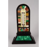 NINETEENTH CENTURY BLACK MARBLE ARCH TOPPED DESK THERMOMETER inlaid with specimen patch work or