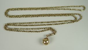 A 9CT GOLD MASONIC BALL suspended from long 9ct cable chain, 38.5grams approx.