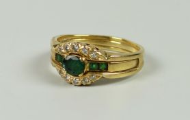 AN 18K GOLD EMERALD & DIAMOND CHIP BUCKLE RING, 5.2grams approx, (size P/Q)