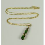 A 9CT YELLOW GOLD FINE NECKLACE ON PROBABLY DIOPSIDE PENDANT, 2.3grams approx.