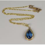 A 9CT YELLOW GOLD NECKLACE & BLUE TOPAZ PEAR SHAPED PENDANT, 9grams approx.