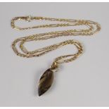 A 9CT YELLOW GOLD FIGARO CHAIN, 3.4grams & smoky quartz pendant