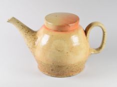 A SARAH WALTON STUDIO POTTERY SALTGLAZED TEAPOT with loop handle and disc lid, potter's mark,