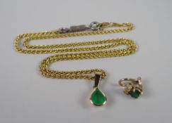 A 14K YELLOW GOLD TWIST NECKLACE with emerald pendant & matching earrings, 12grams approx.