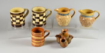 A PARCEL OF SLIPWARE POTTERY VESSELS including veined marble mug, pair of geometric pattern mugs,