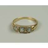 A 15CT YELLOW GOLD THREE-STONE RING, 2.7grams approx, (size N/O)